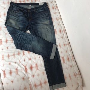 Distressed boyfriend cut denim