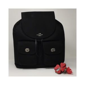 Brand new women's black coach backpack