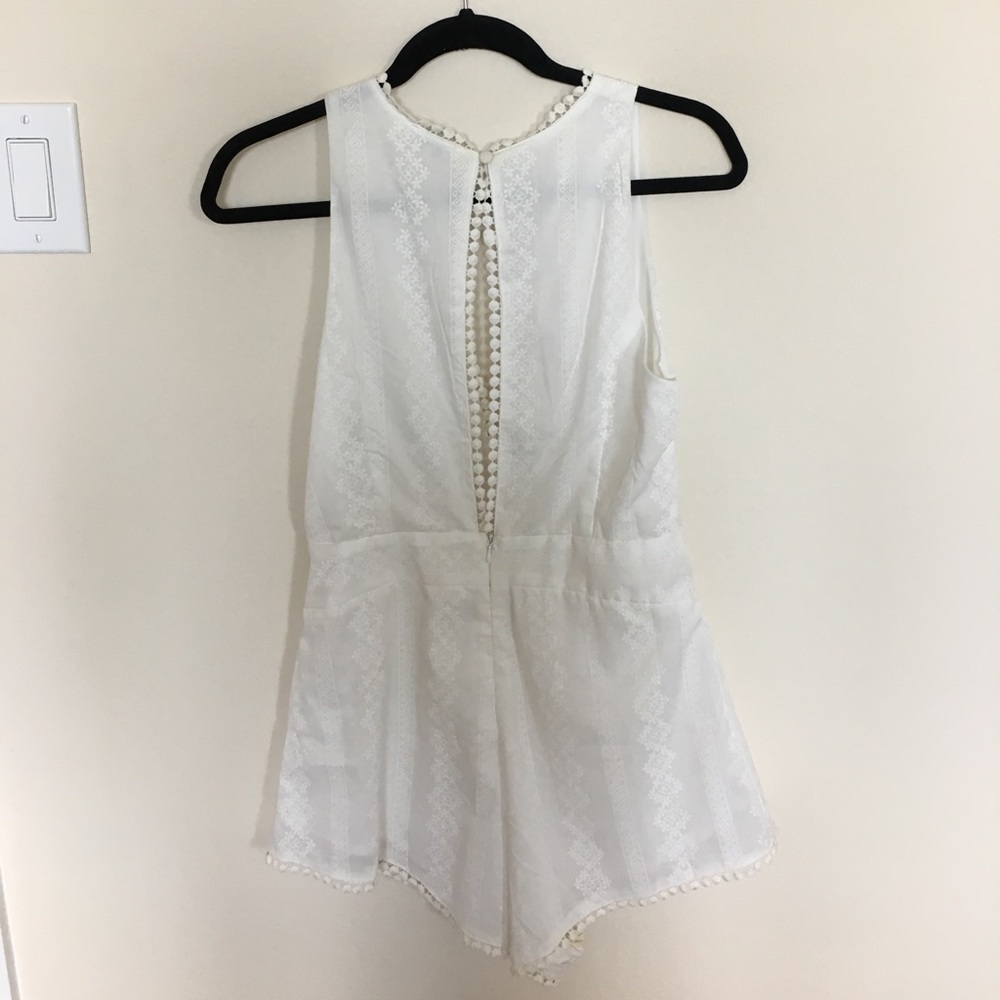 {SOLD} TOBI Plunging Neckline White Romper - Picture 2 of 5