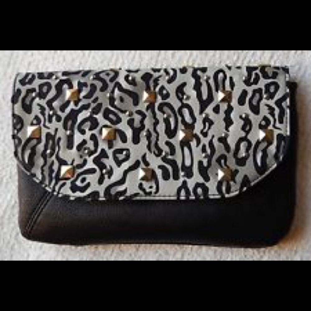 Grace Adele Faith Ocelot Clutch