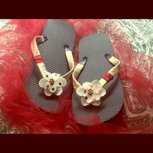 Metallic gold ribbon wrapped sandals