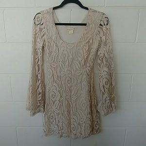 Cream colored long sleeved lace dress