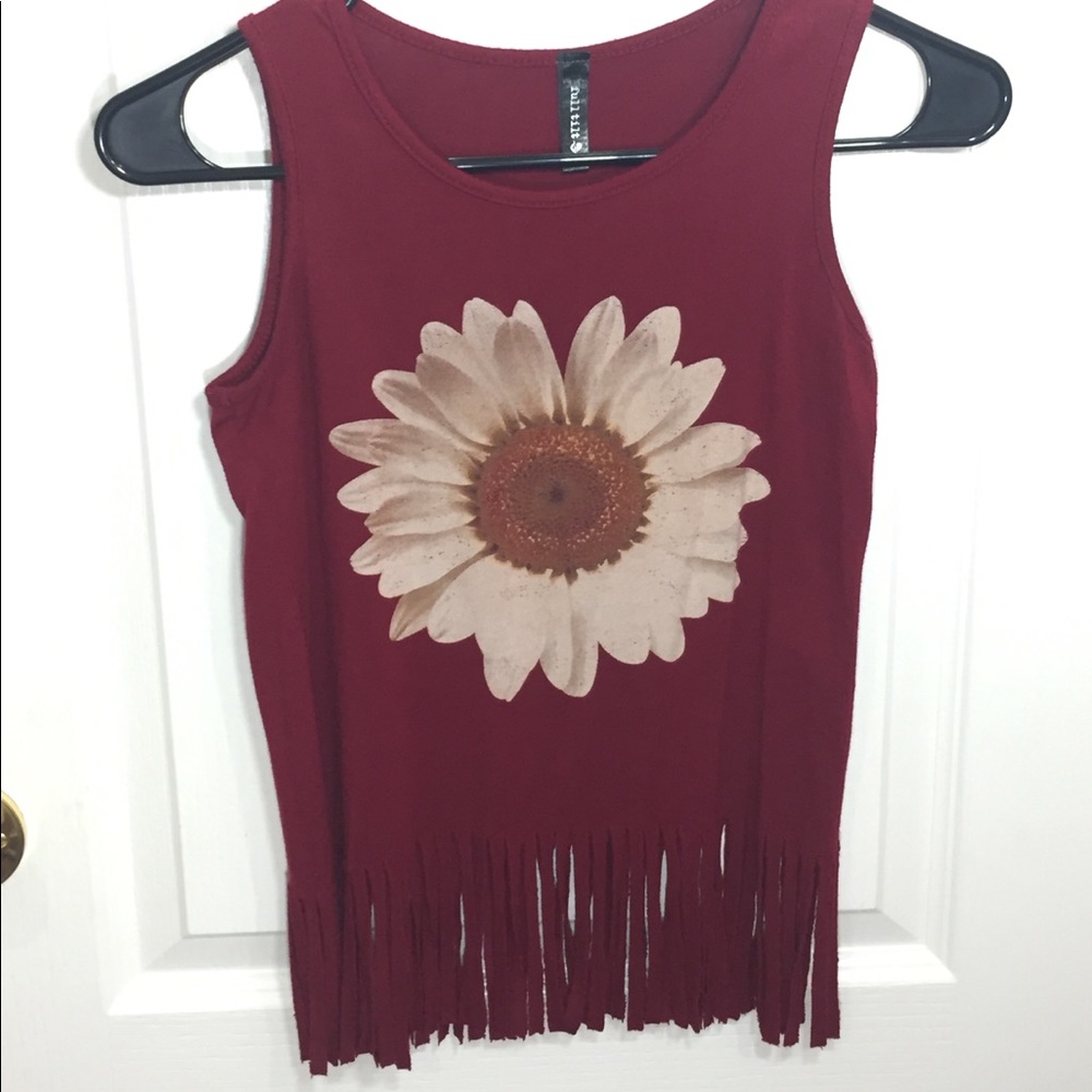 Burgundy colored tank top with a fringed bottom