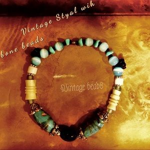 Vintage beads, bone made in a stretchy bracelet