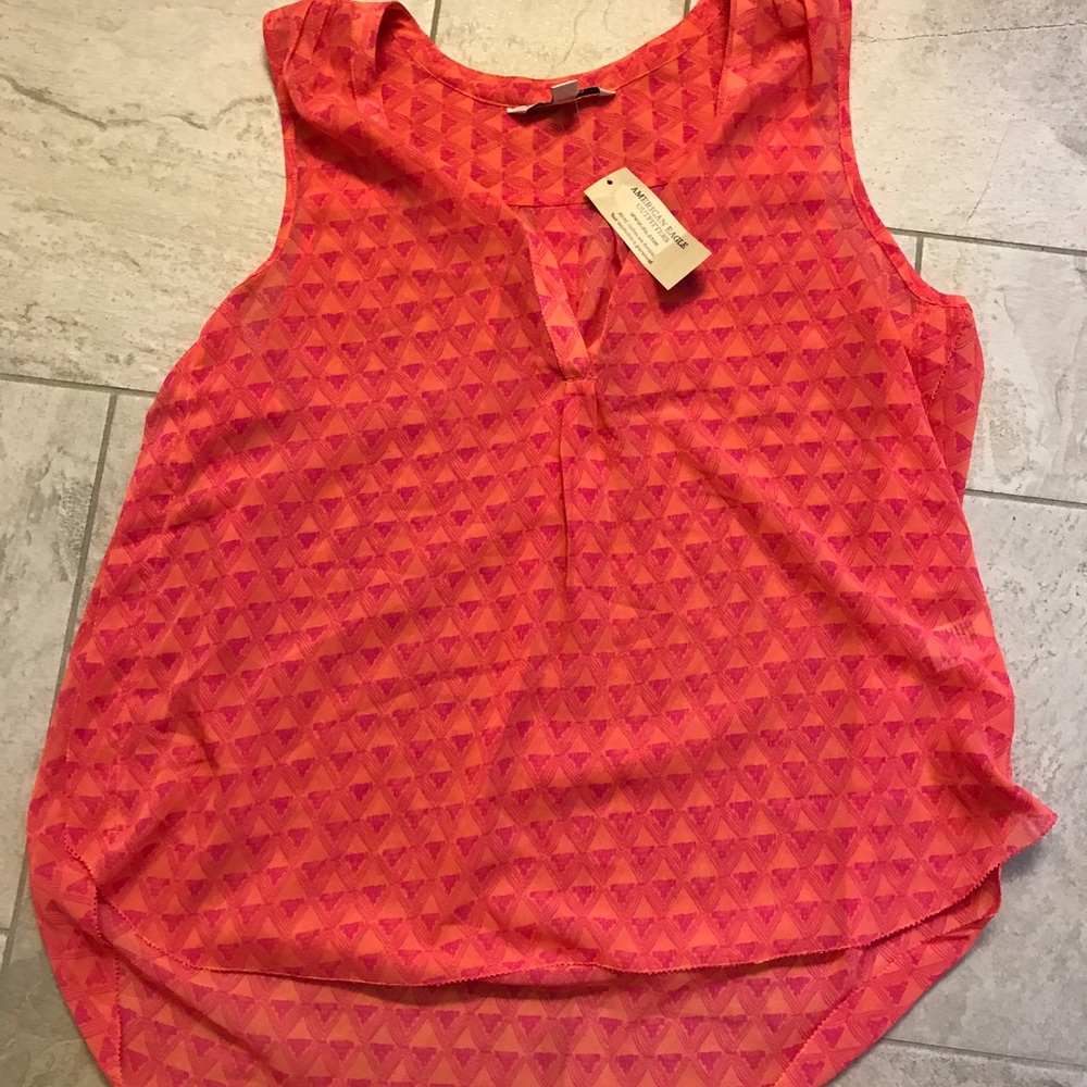 Sunset colored top! Never worn before!