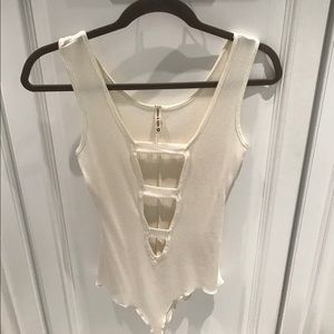 NEVER BEEN WORN LF white cut out body suit