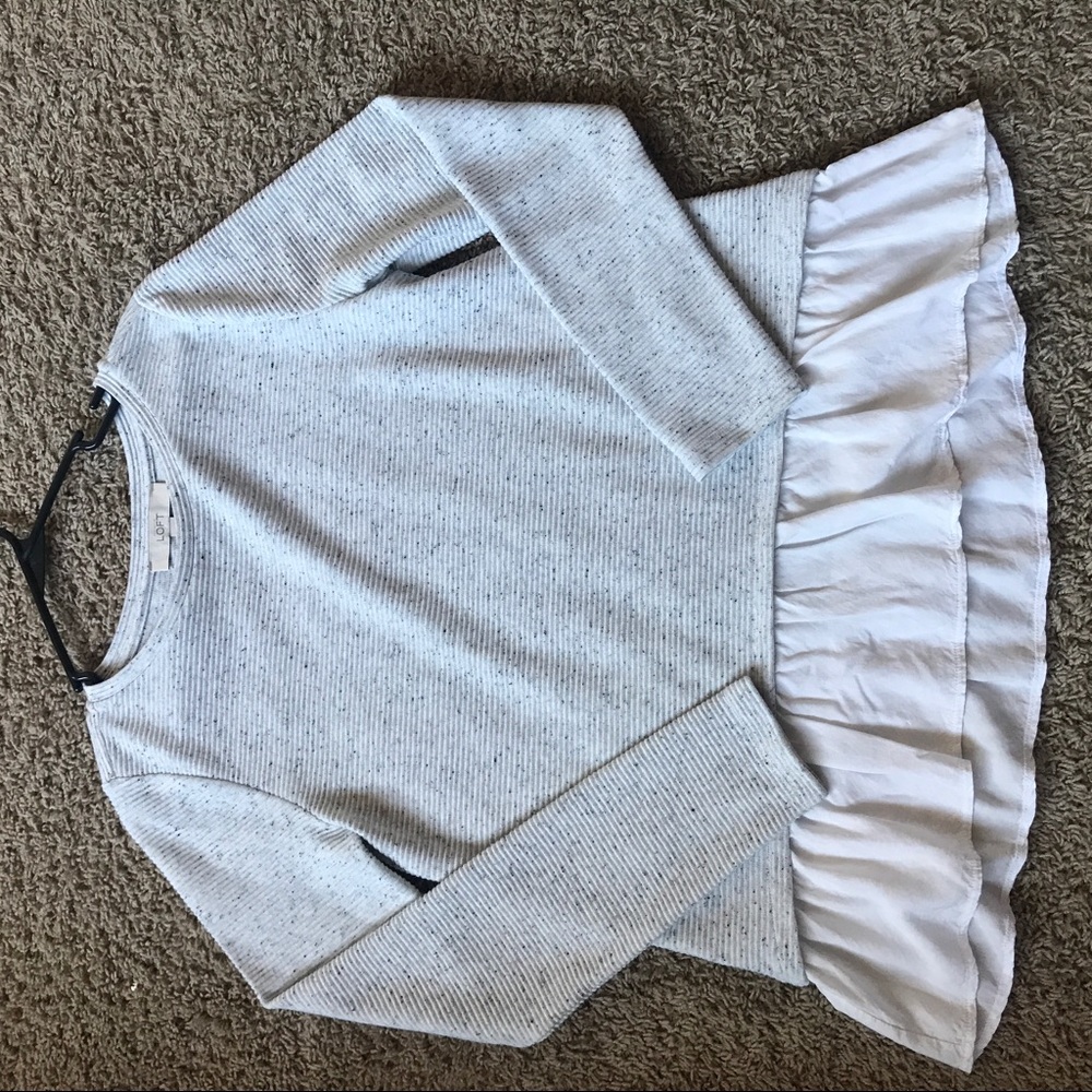 Mixed media peplum top.