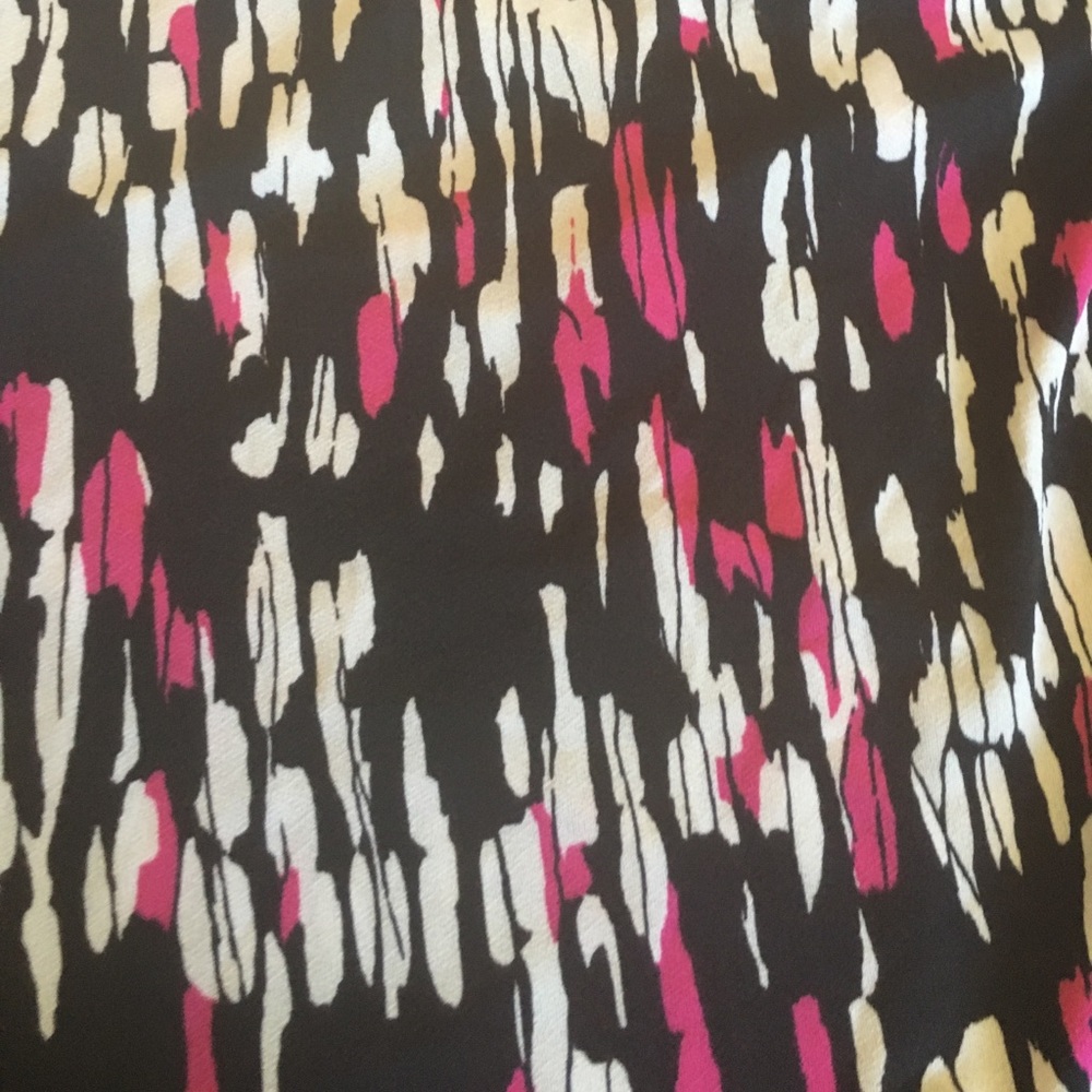 Short sleeve blouse flowy and comfortable.