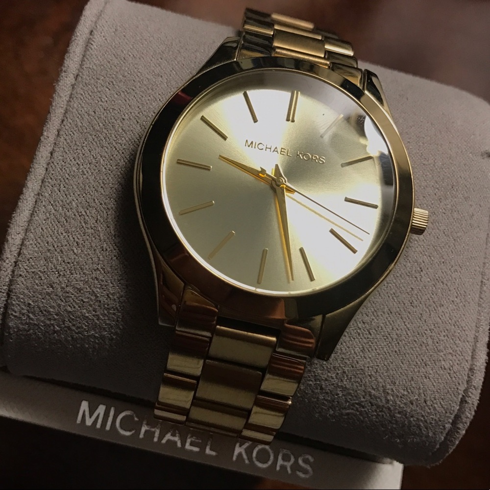 Slim-runway Gold-toned stainless steel MK watch