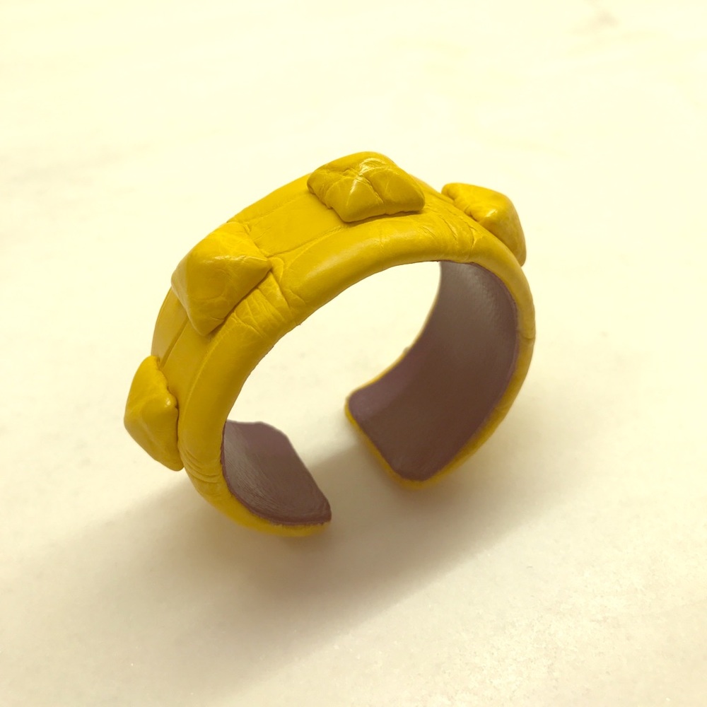 Yellow gator rock stud bracelet