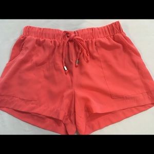 lose flowy salmon colored shorts