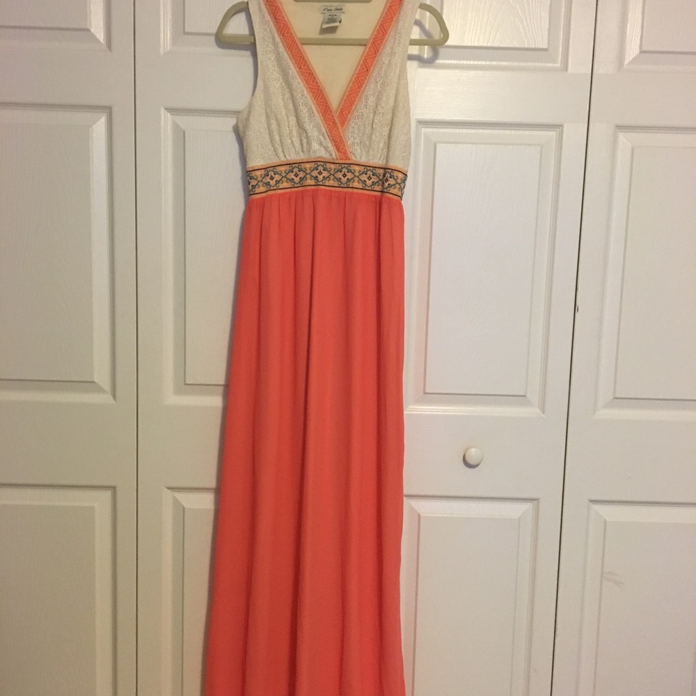 Cream top with a fluorescent coral/orange bottom