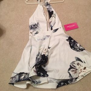 White halter dress with floral patterns