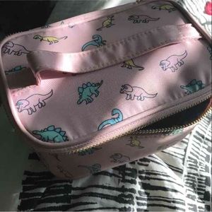 Pastel dinosaur makeup back