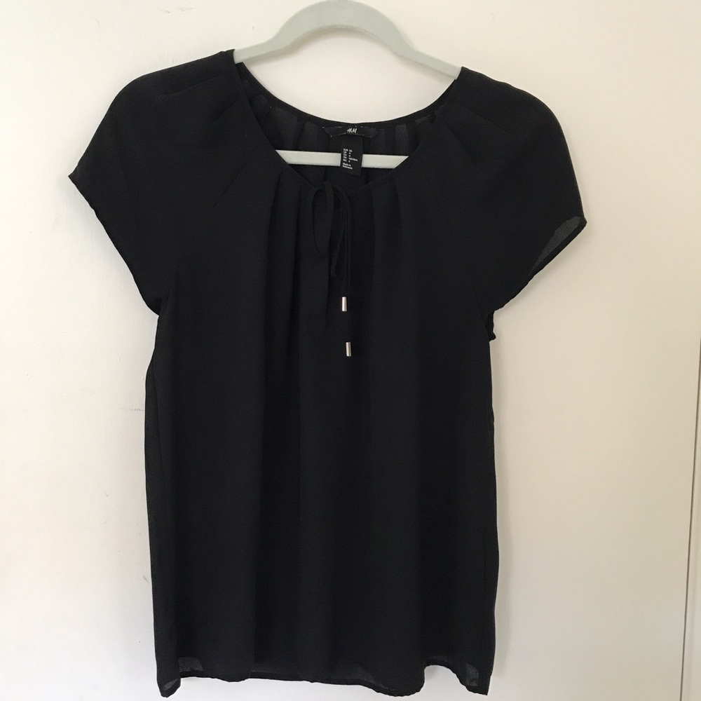 H&M black short sleeve blouse. Tie detail. Size 6