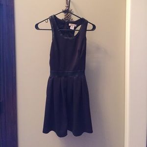 Black baby doll dress with leather detail