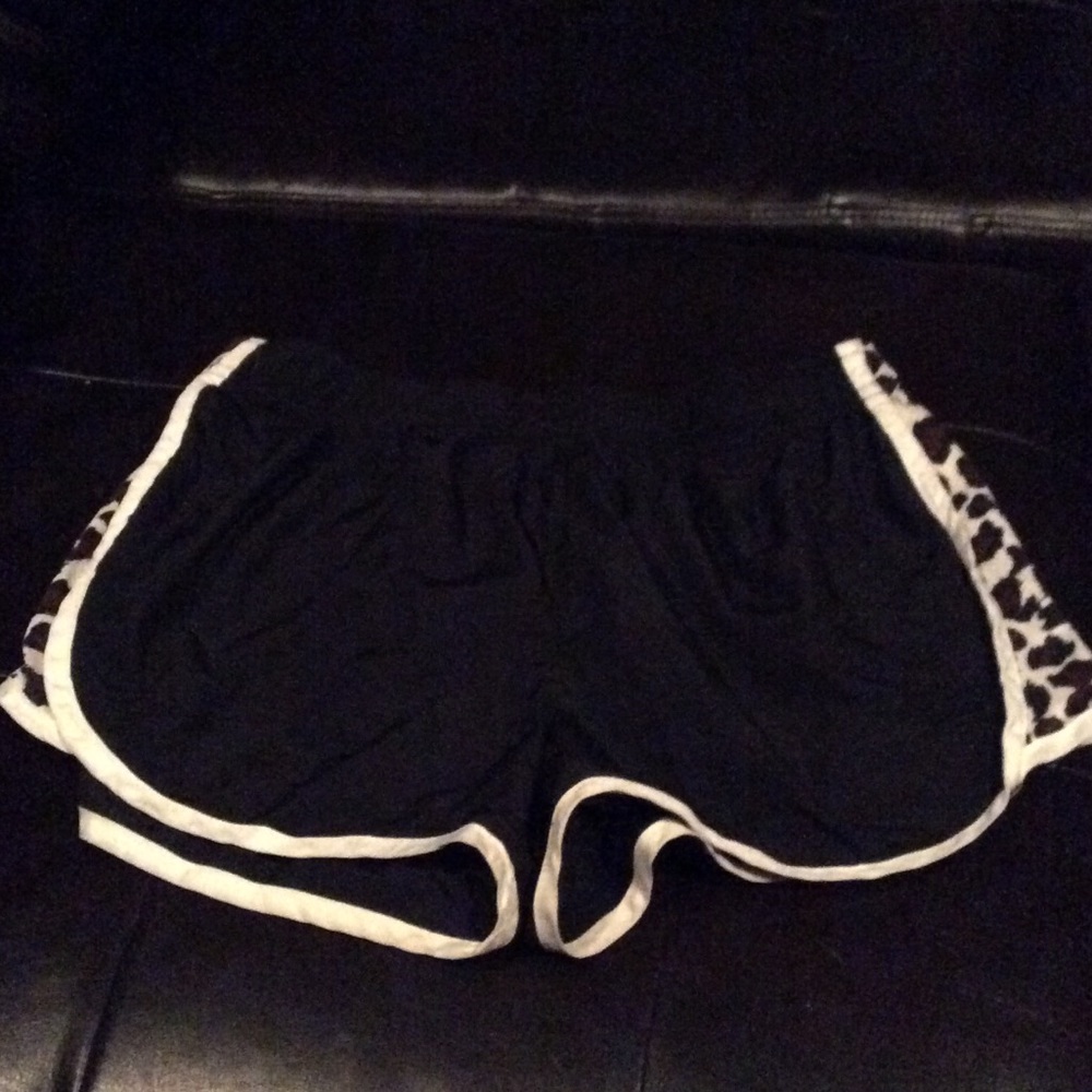 Running shorts cheetah sides