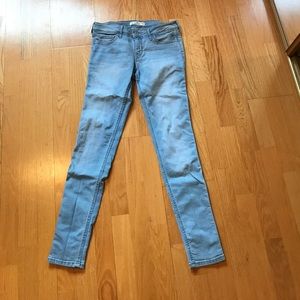 Light wash super skinny jeans