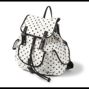 Claire's black and white polka dot backpack