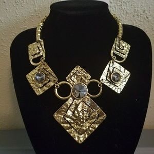 Large burnish metal fashion necklace