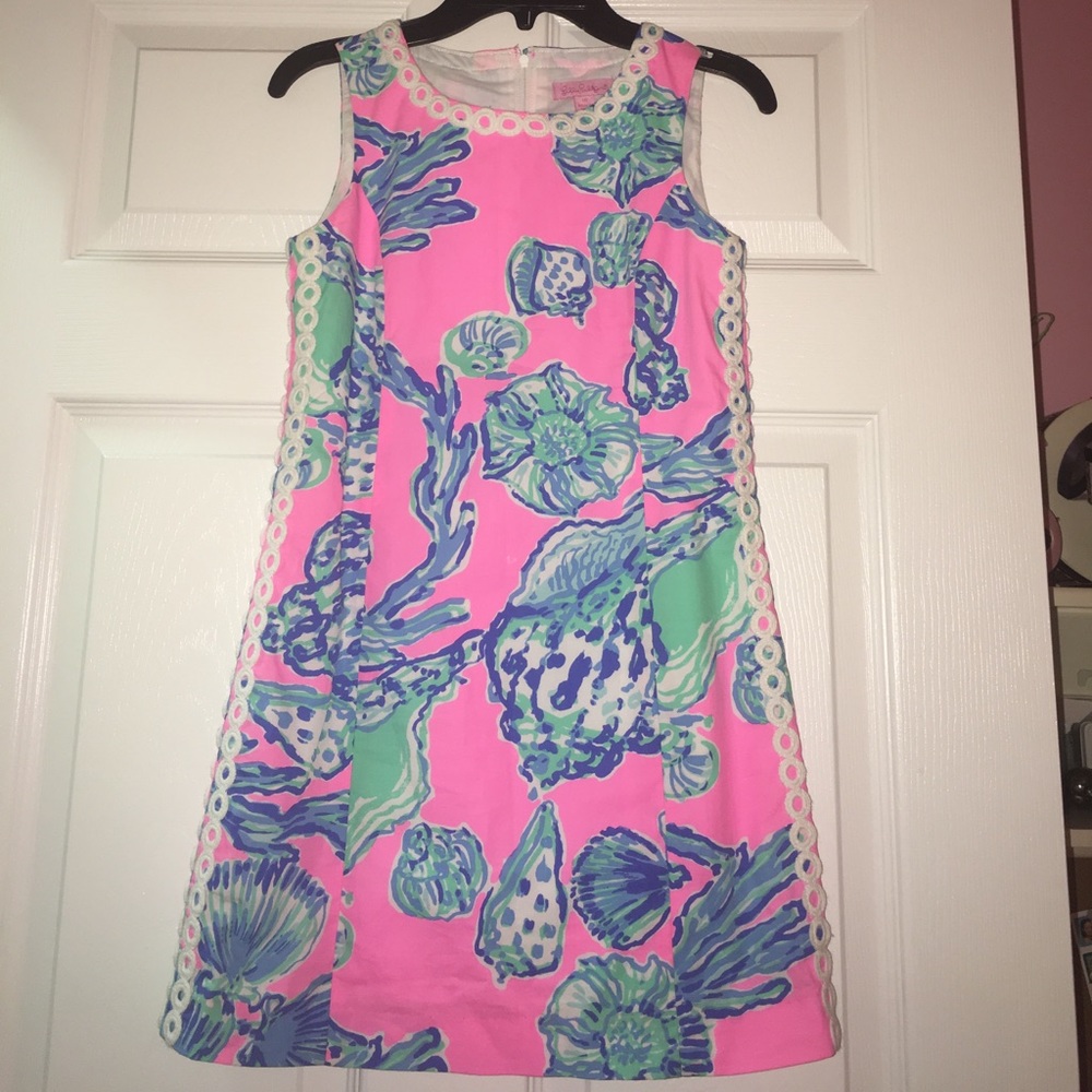 Pink Lilly. Embellished neckline and sides.