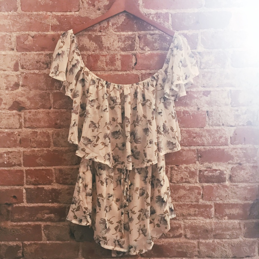 Off the shoulder floral romper. New with tags.