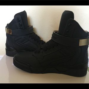 Givenchy Metal trimmed Leather high top sneakers