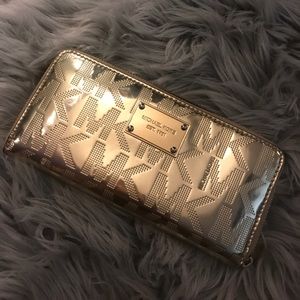 Gold MICHAEL KORS zip around wallet
