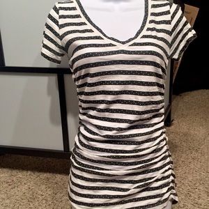 V neck tee.                                     24