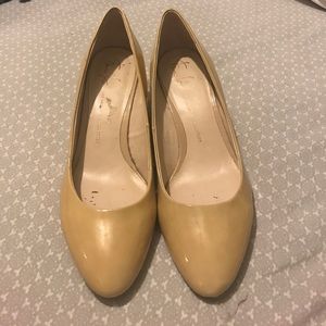 Franco Sarto nude patent leather/wicker wedges.
