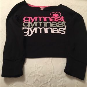 A gymnastics justice sweat shirt