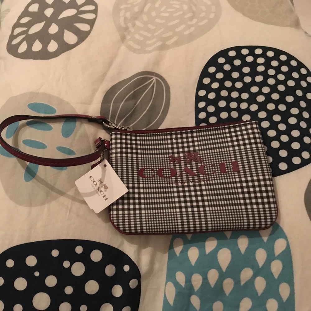 Brand new cranberry coach wristlet