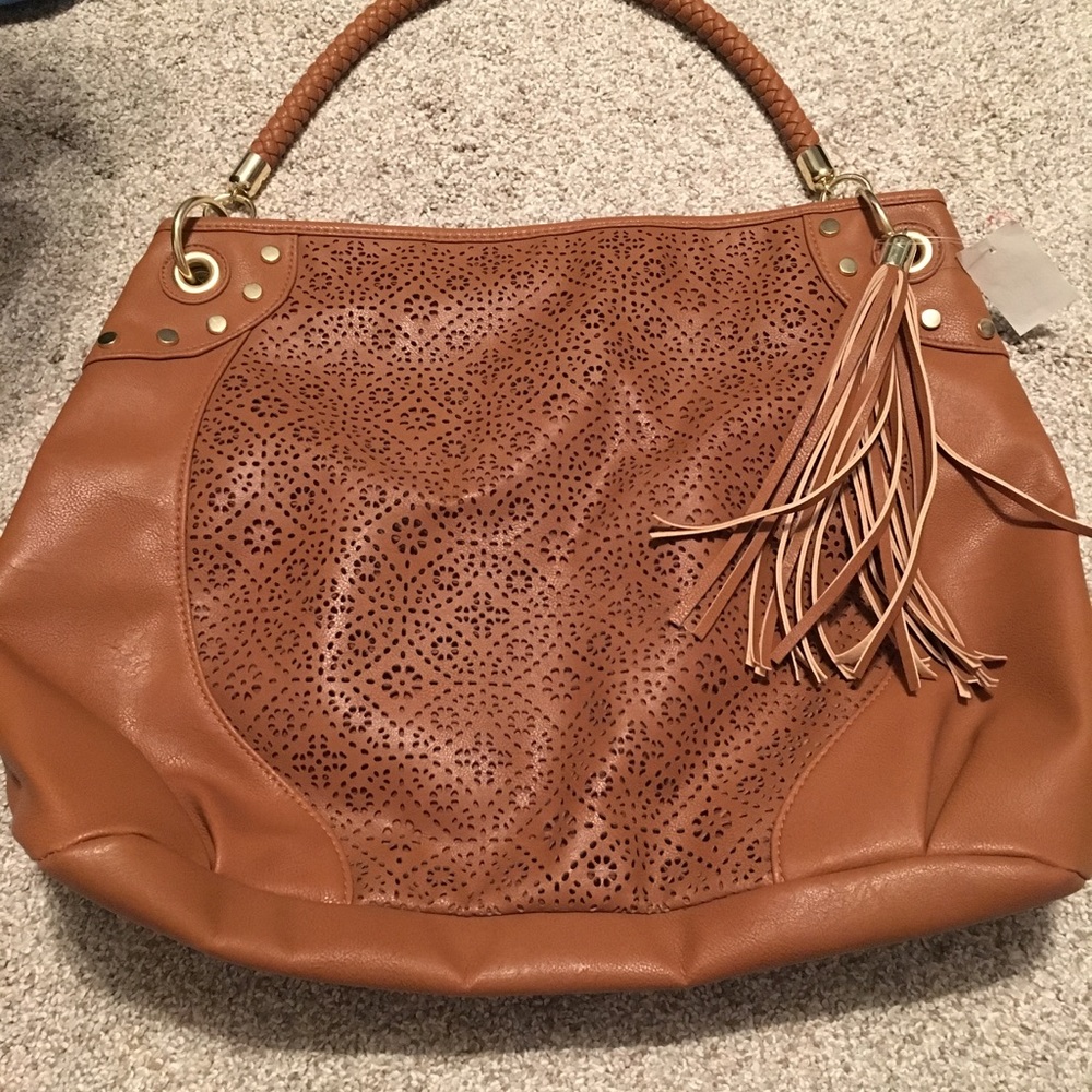 Very cute purse/large bag!