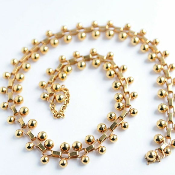 Gold tone Belt in blend metal.