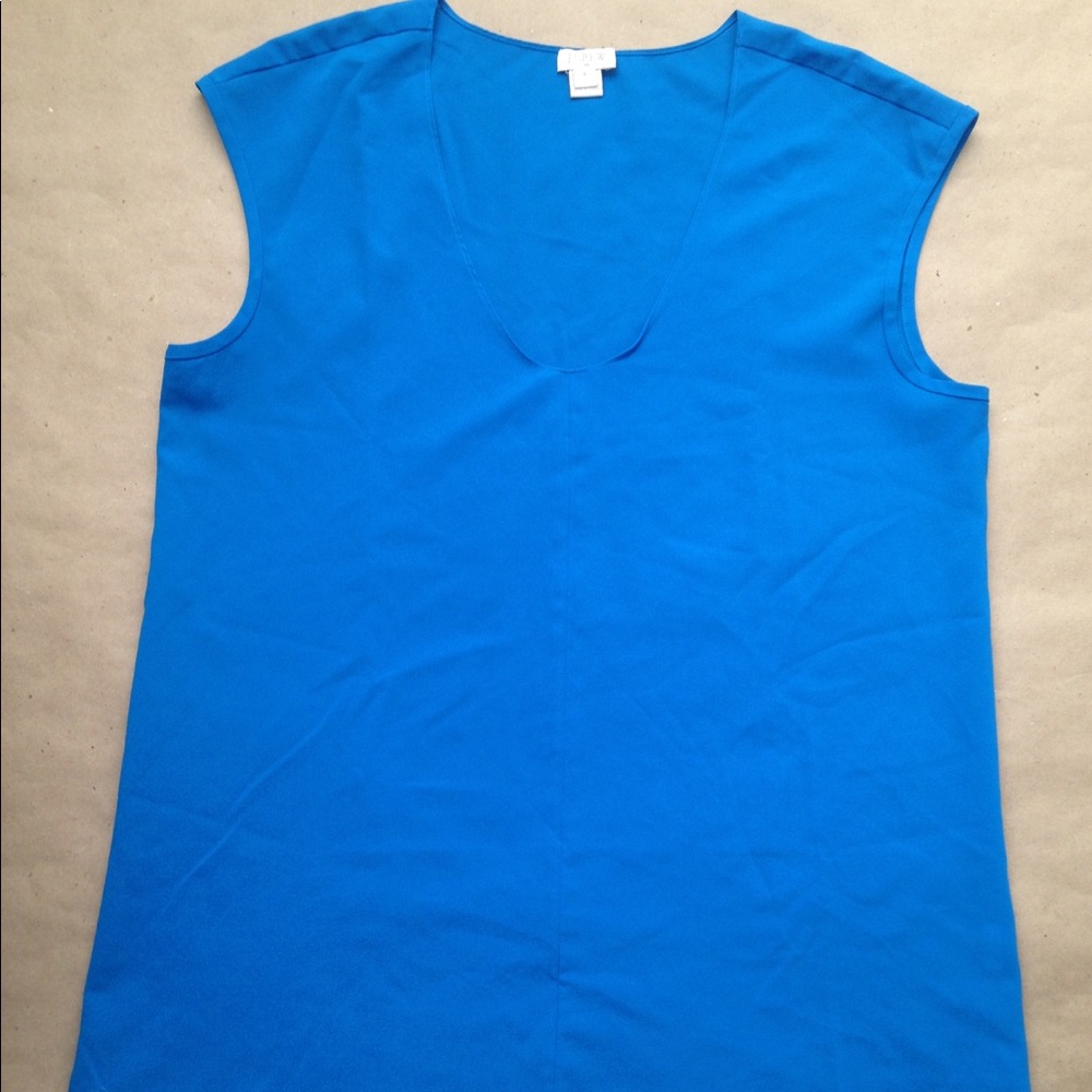 Blue cap-sleeve shirttail blouse