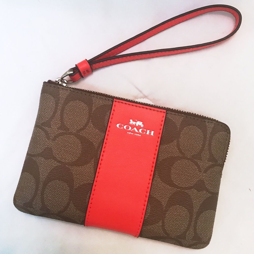 Coach wristlet Orange and brown with C's NWT