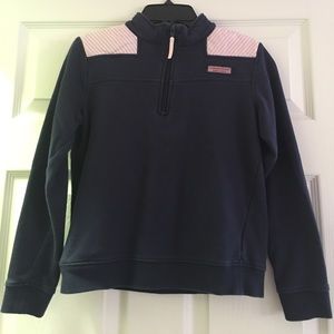 Navy and pink pullover.