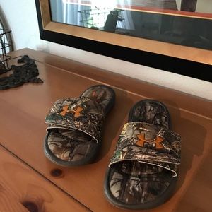 Sold, on eBay. Under Armour slides