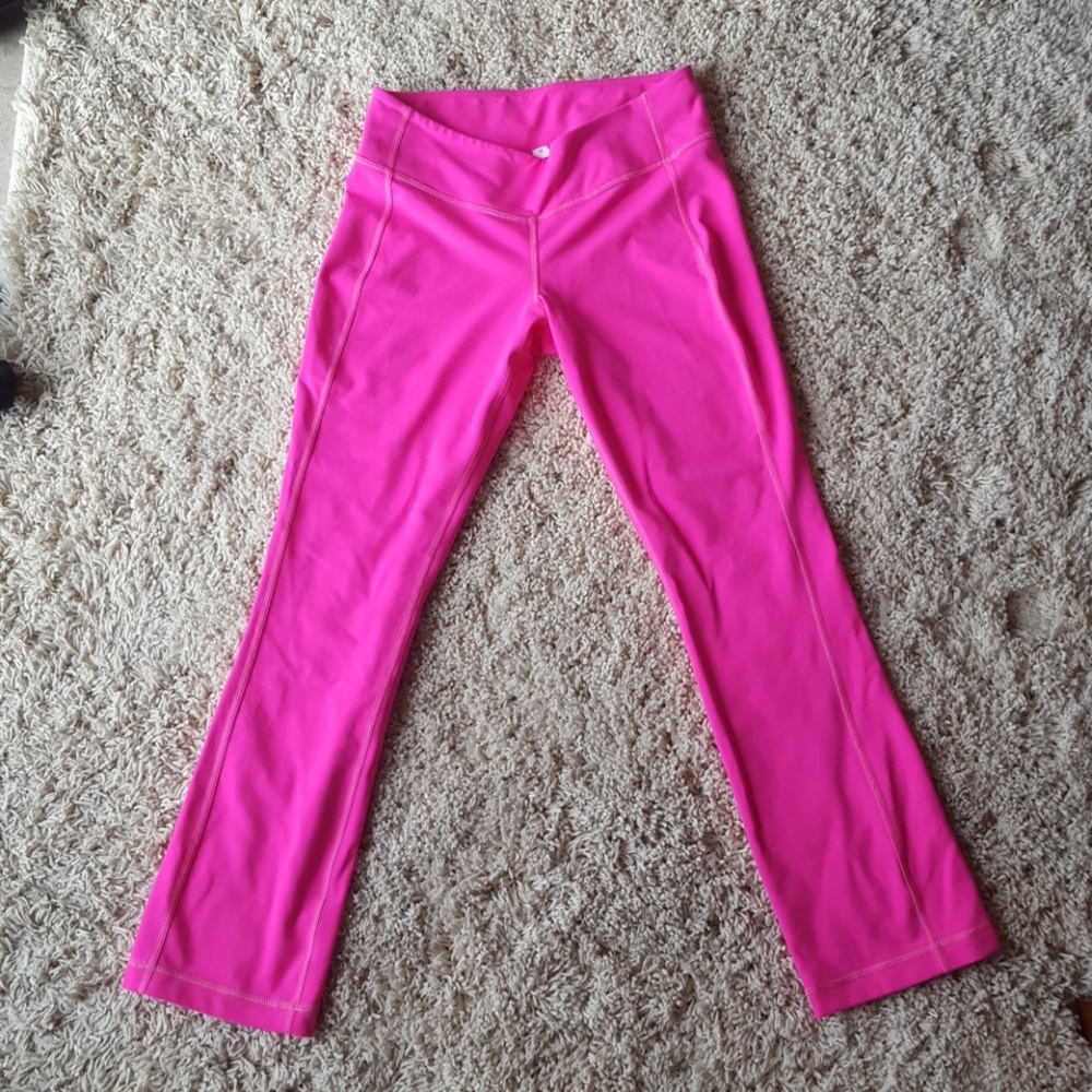 Bright pink Lululemon Straight leg pants.