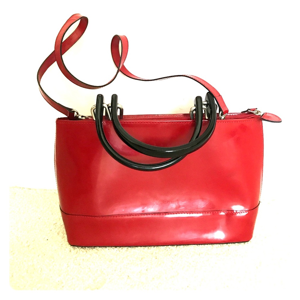 Red genuine leather purse made in Italy.