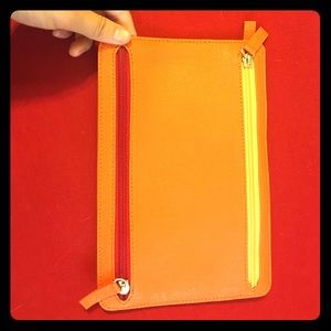 4 pocket orange clutch from Indonesia