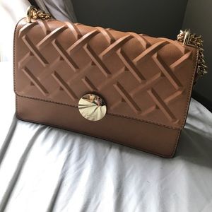 Also tan purse / crossbody