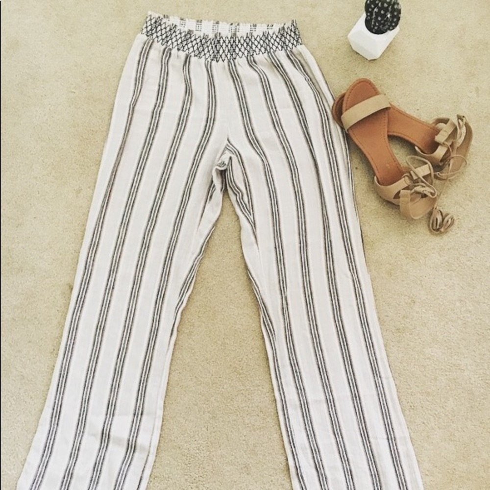 Cream colored pants with stripes