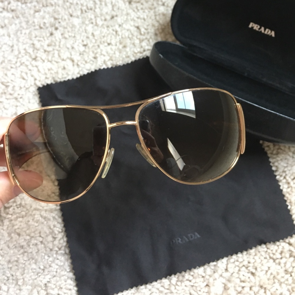 Gold and brown Prada aviators