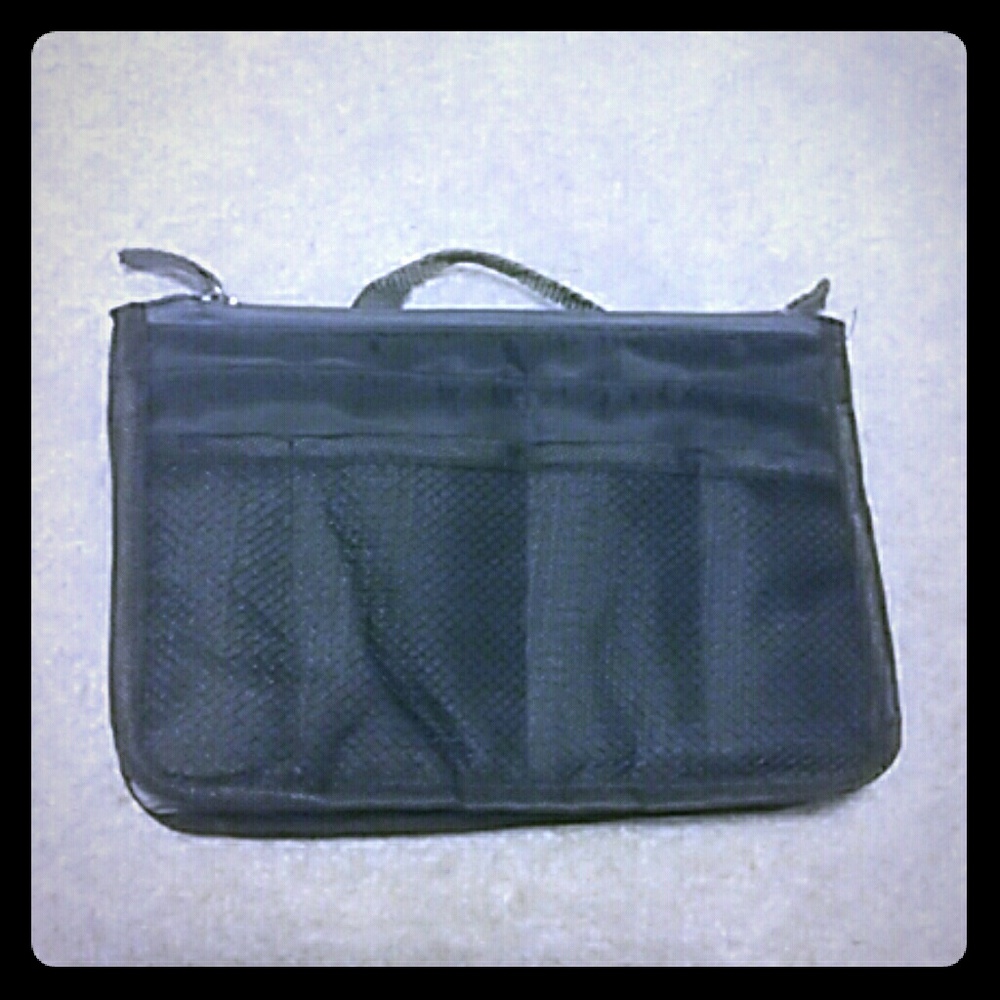 Three pocketed makeup bag