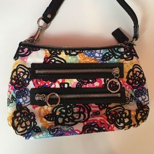 Unworn floral coach purse