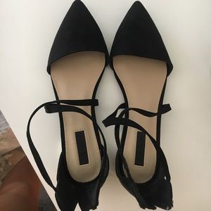 Black pointy flats