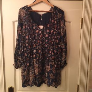 Long sleeved loose fit indigo floral pattern dress