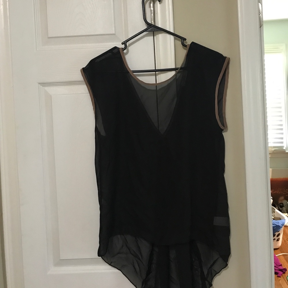 Sheer black top trimmed in tan