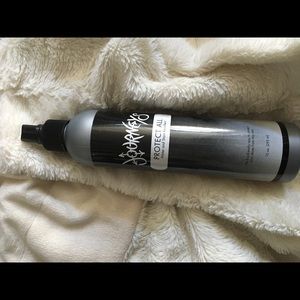 Water resistant spray